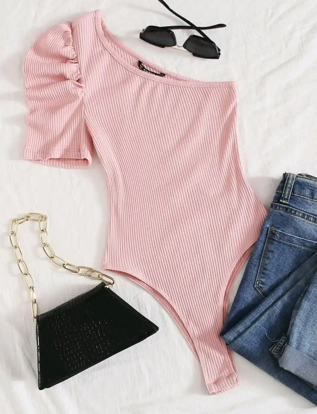 Body de un hombro manga farol color rosado 