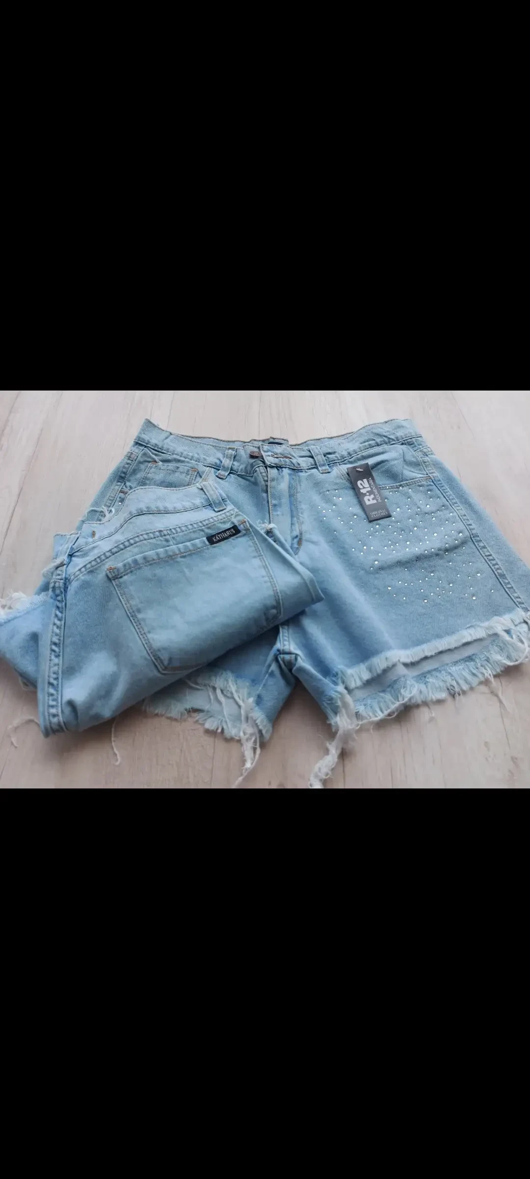 SHORTS CON STRACK 