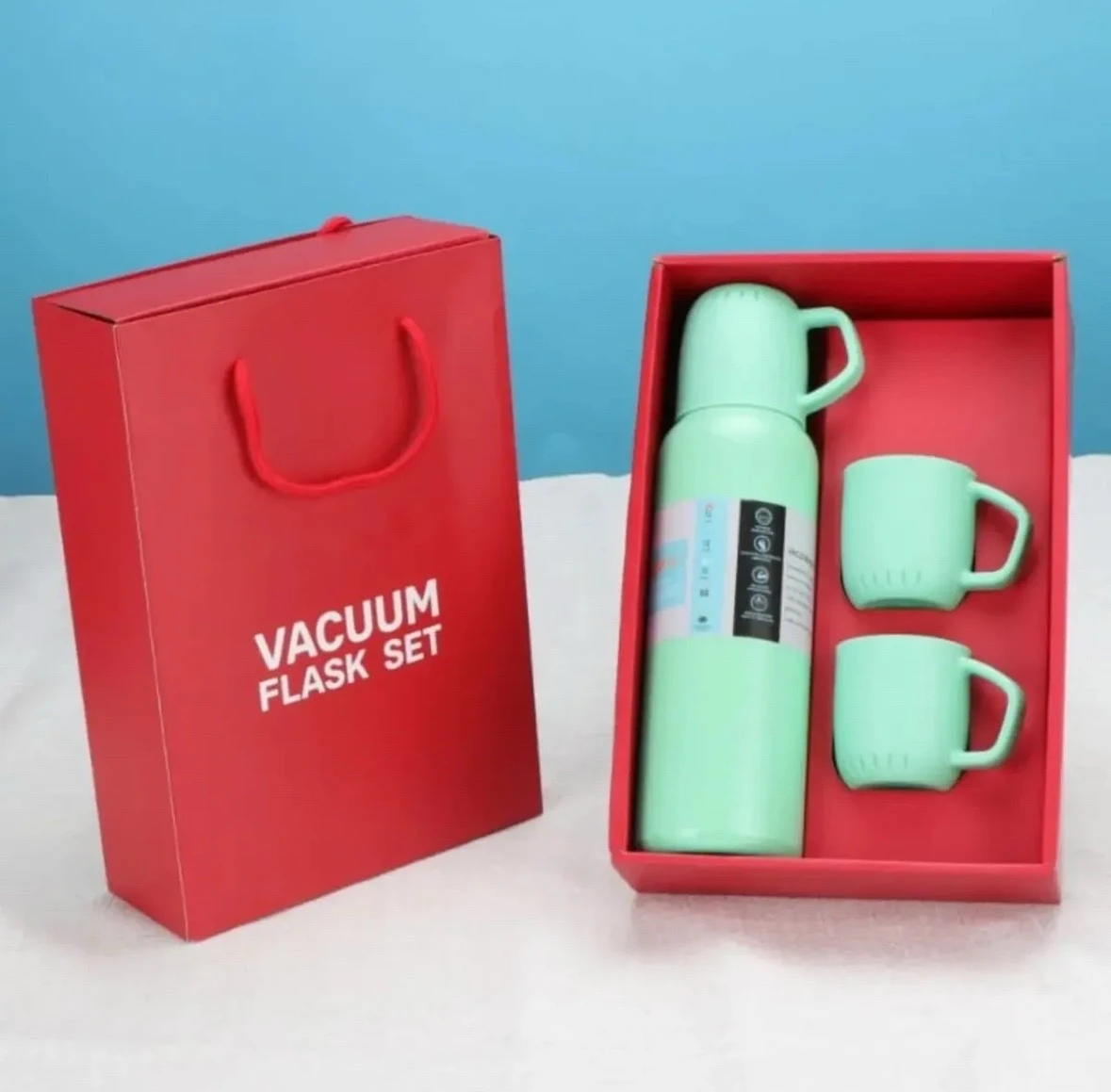 TERMO DE 600 ml con tres tazas. acero INOXIDABLE 4