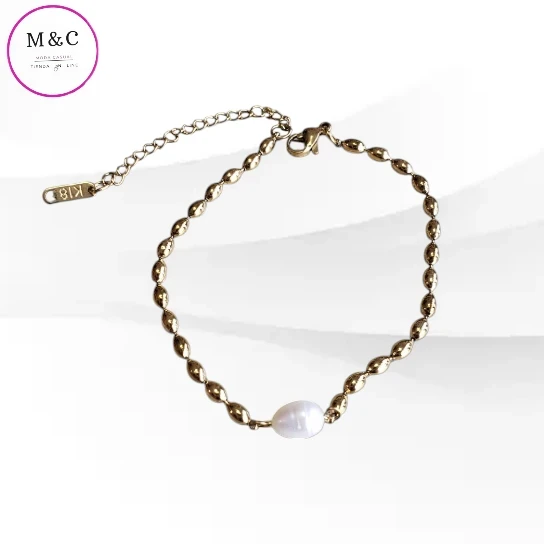 pulcera con perla blanca