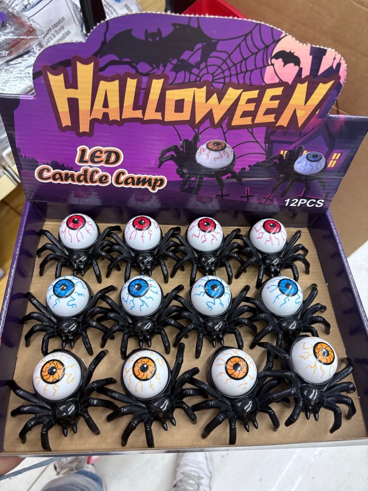 caja con 12 velas led en forma de araña