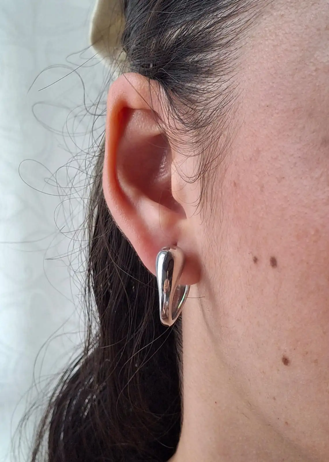 ARETE CURVO PLATEADO 