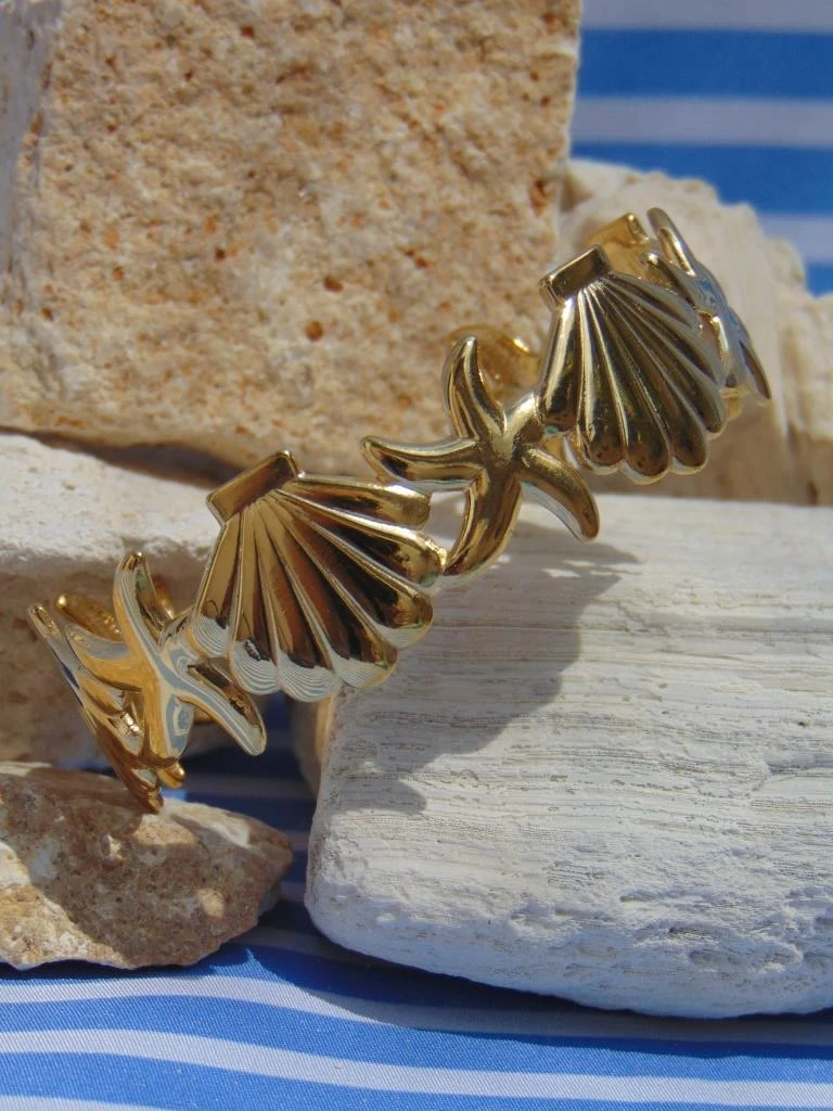 BRAZALETE ACERO DOR ESTRELLAS CONCHAS
