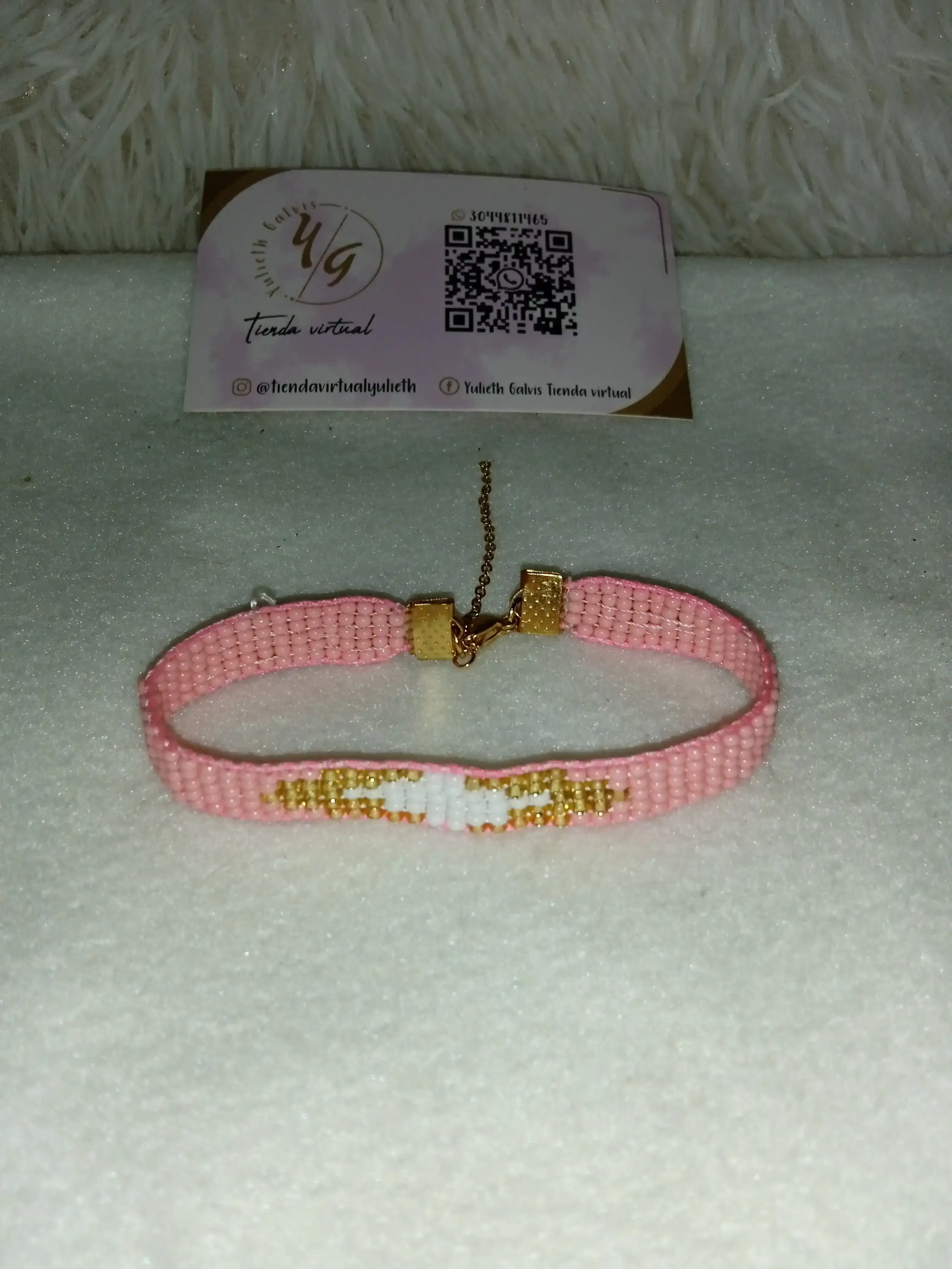 PULSERA EN TELAR ROSA Y BLANCO