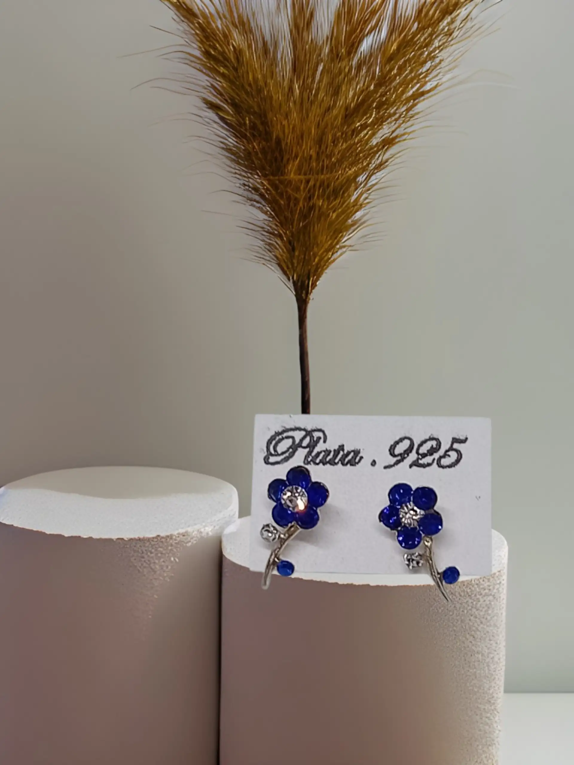 Broquel de flor azul marino