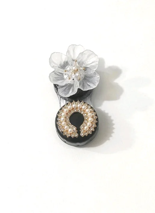 estuche para pupilentes flor/negro 3