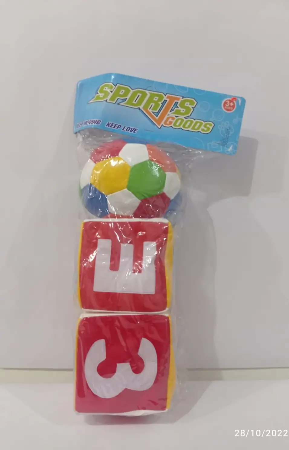 Pelota y dados en bolsa bebé 