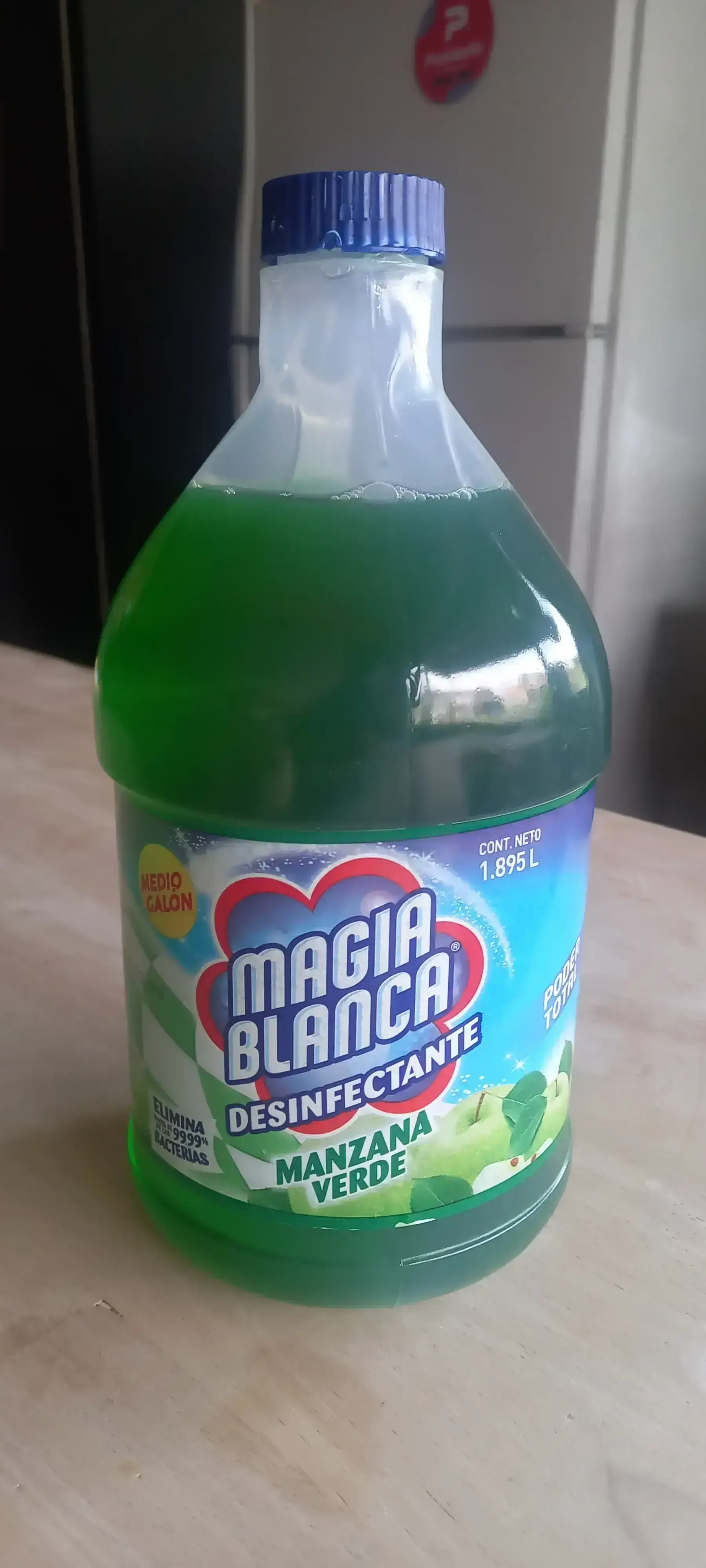 Desinfectante magia blanca medio galón manzana verde