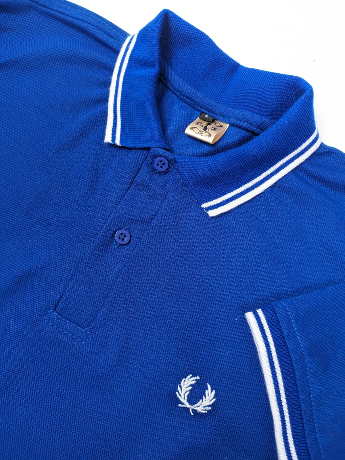 Camisa polo azul rey 