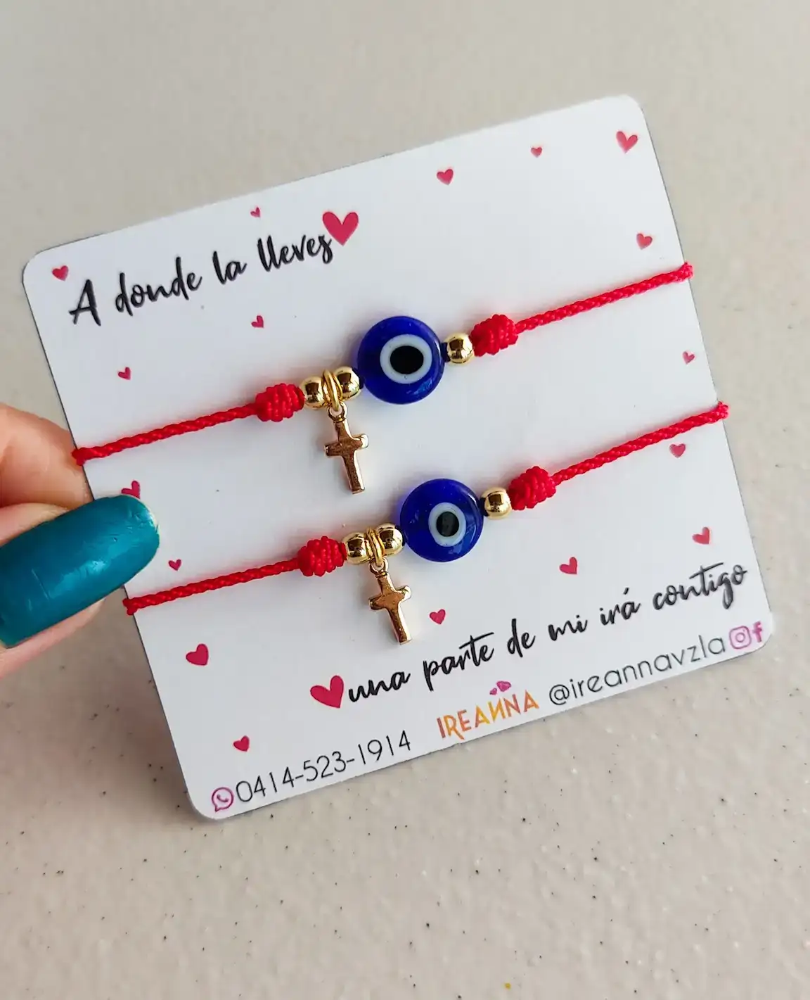 Par pulseras ojo turco y cruz 