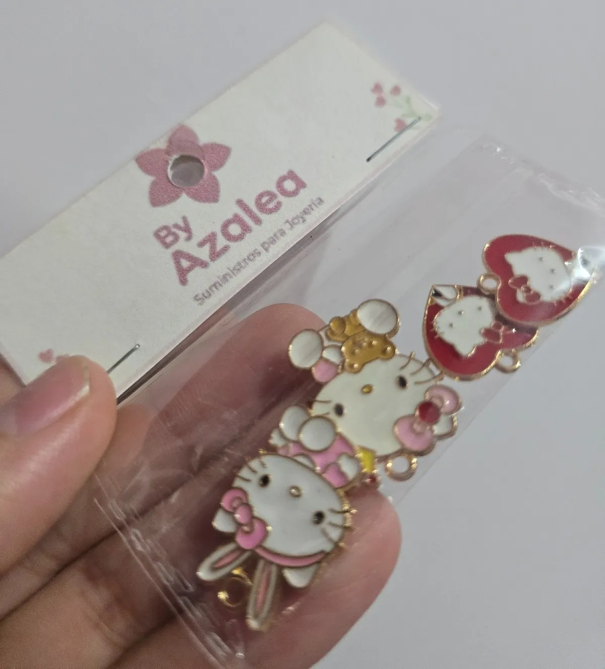 Dijes Hello Kitty rojos