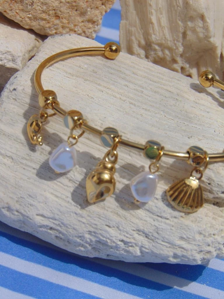 PULSERA ACERO ARO DOR DIJES CONCHAS PERLAS