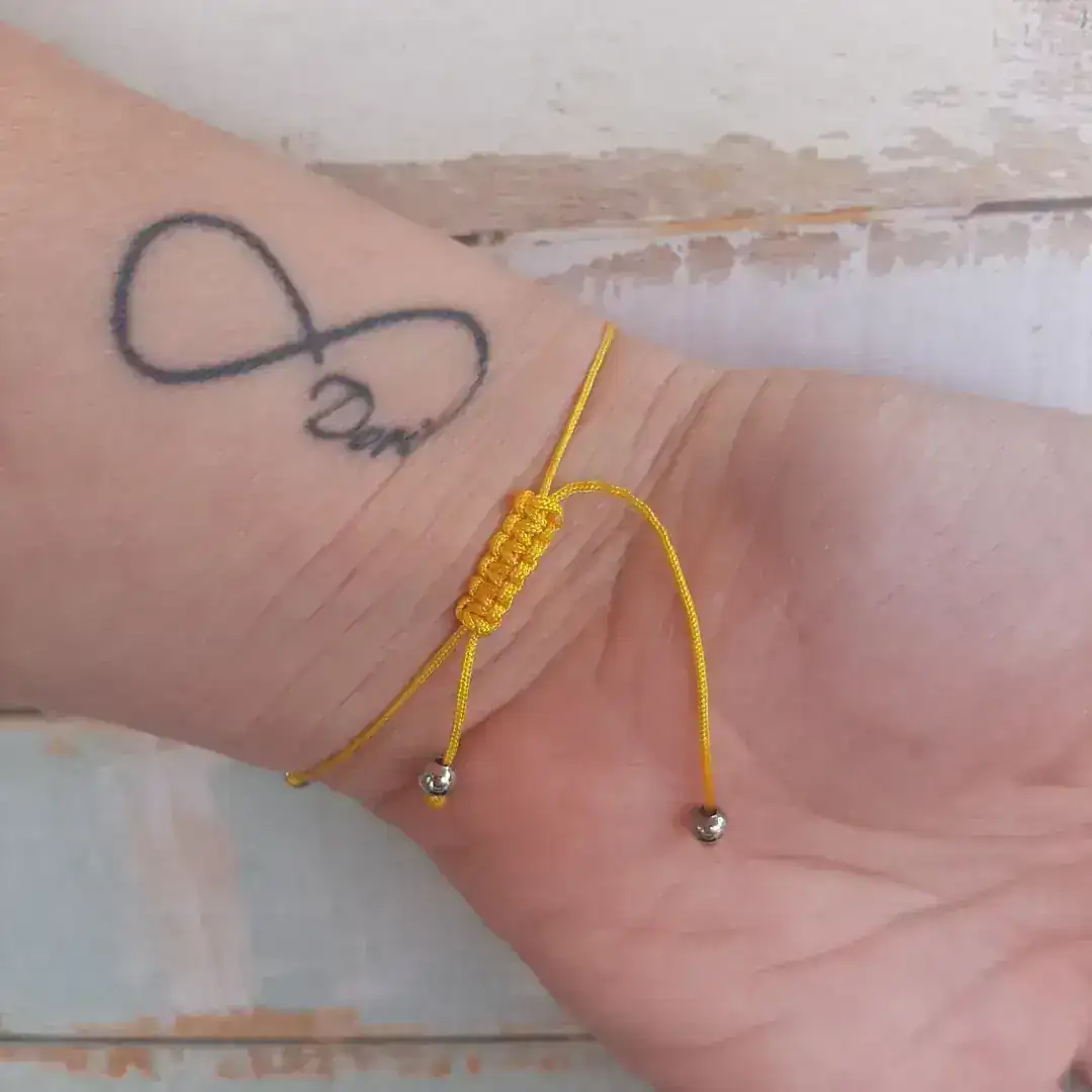 Pulsera hilo amarillo  2