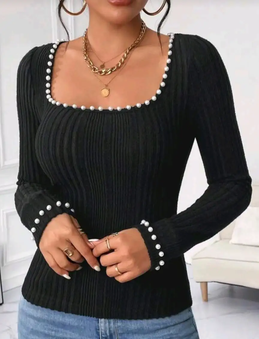 Blusa Negra con perlas 