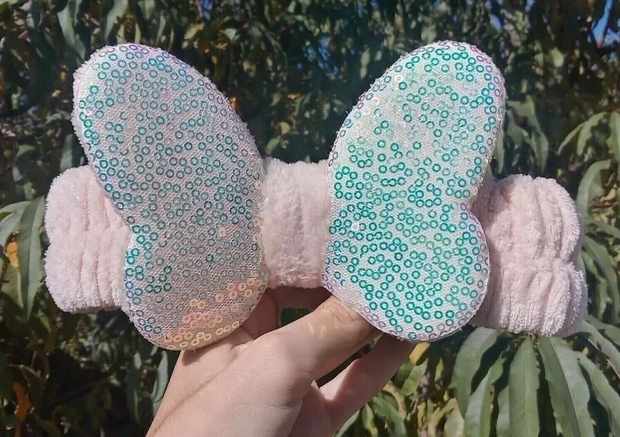 VINCHA MARIPOSA CON LENTEJUELAS TORNASOL