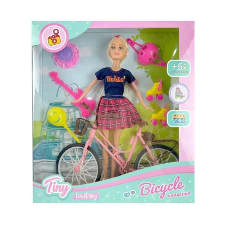 Muñeca Tiny su bicicleta 