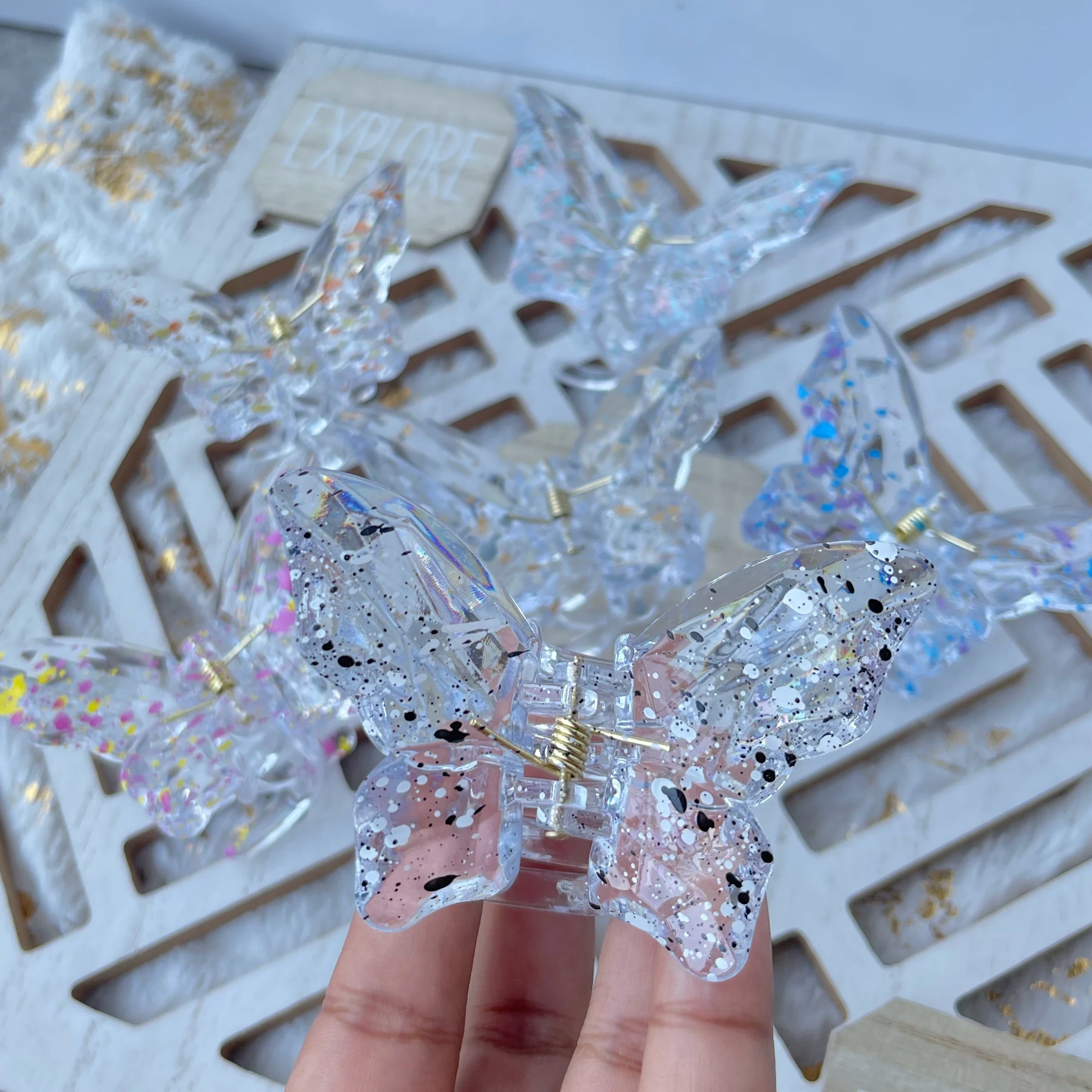 PINZA PARA CABELLO MARIPOSA PINTAS