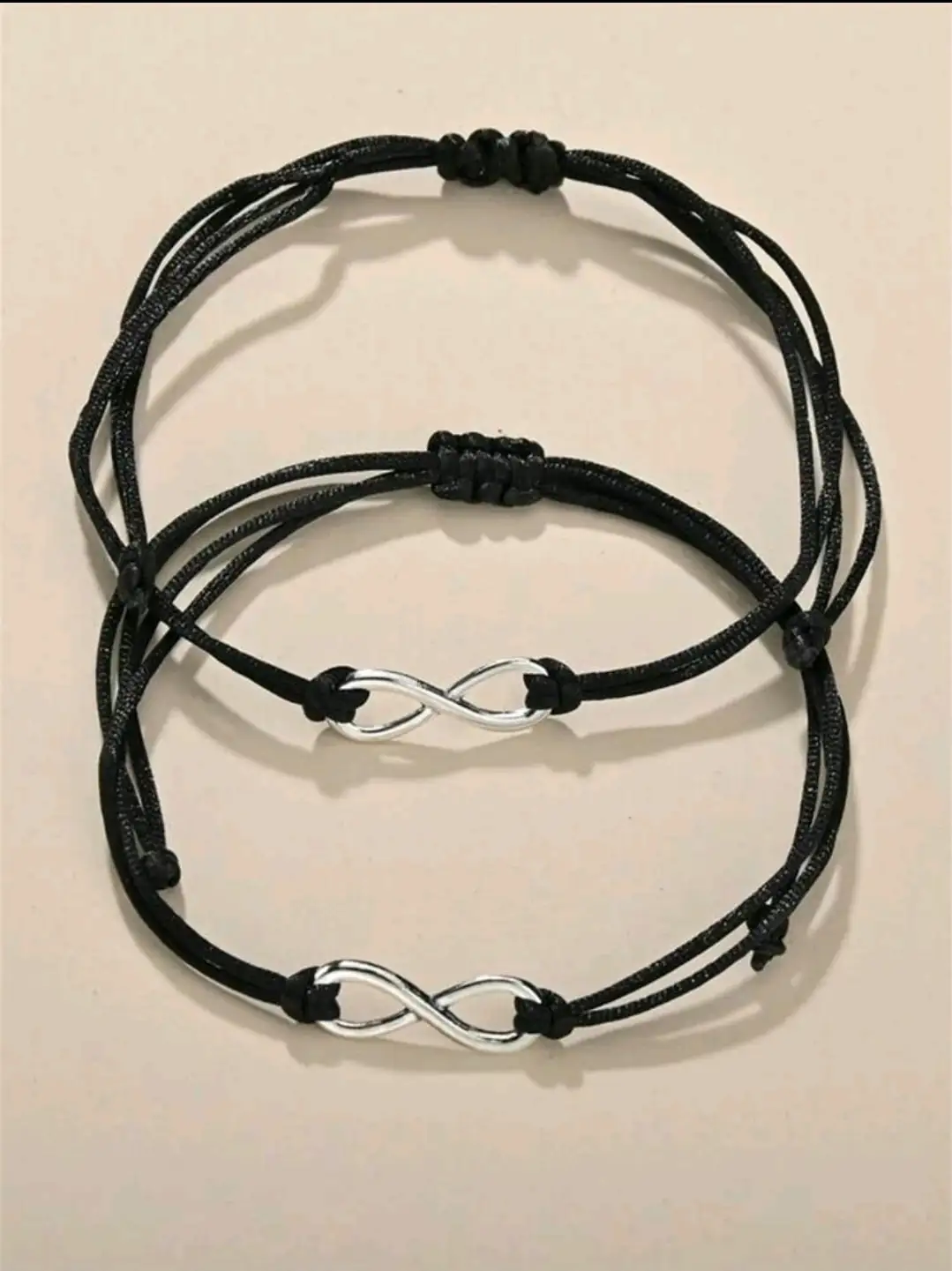 Par de pulseras con infinito
