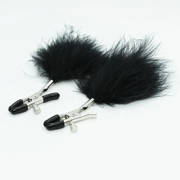 Pinzas para pezones con plumas
