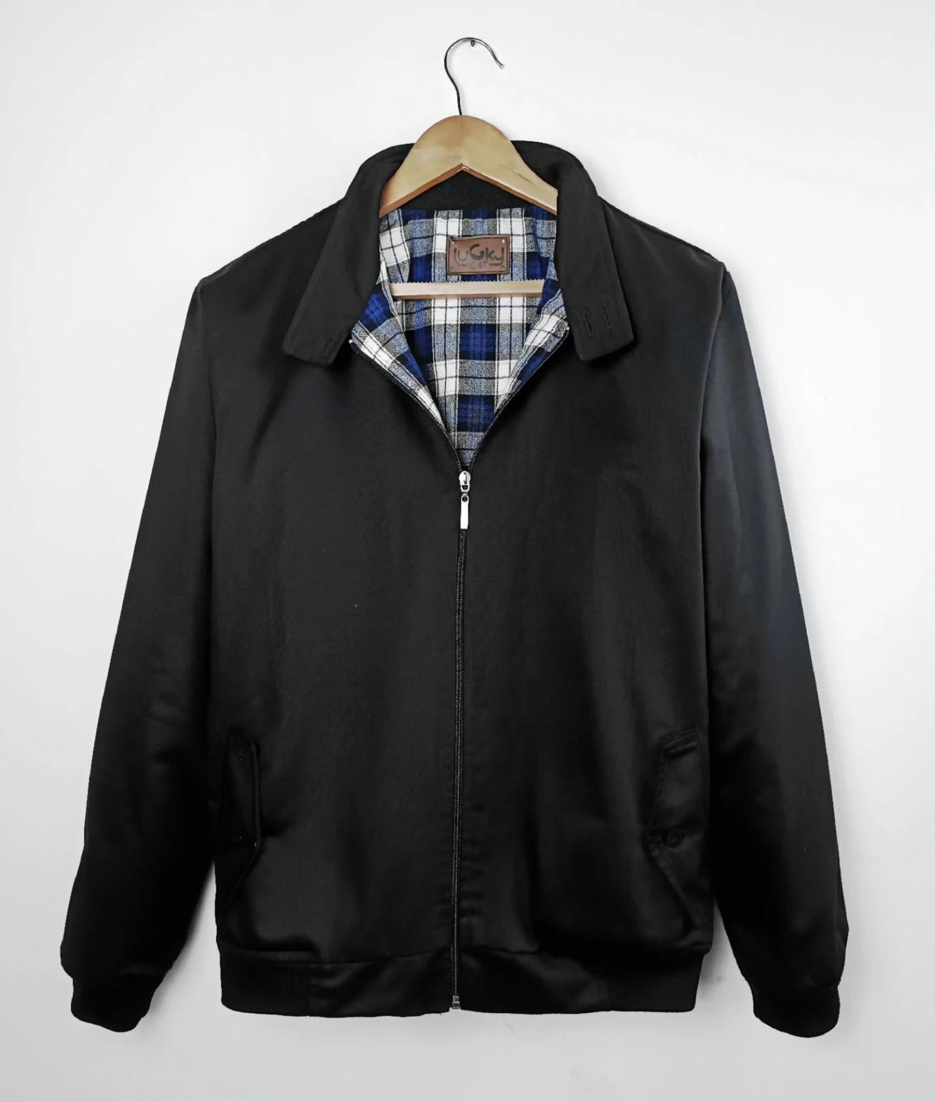 Chaqueta estilo harrington negra forro cuadros azules 