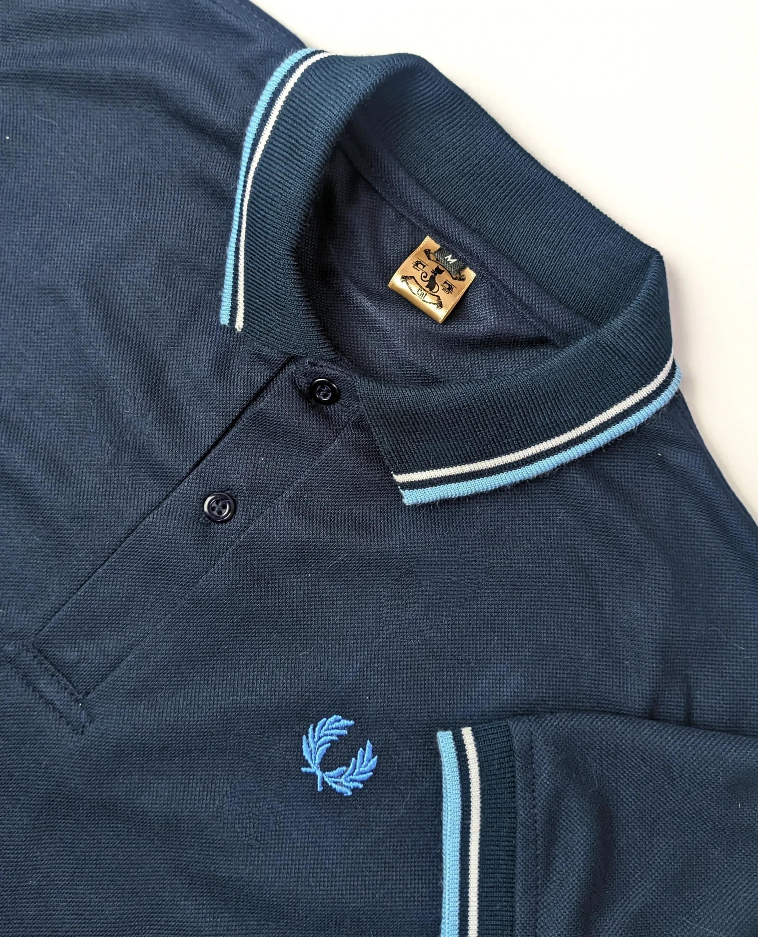 Camisa polo azul oscura talla s