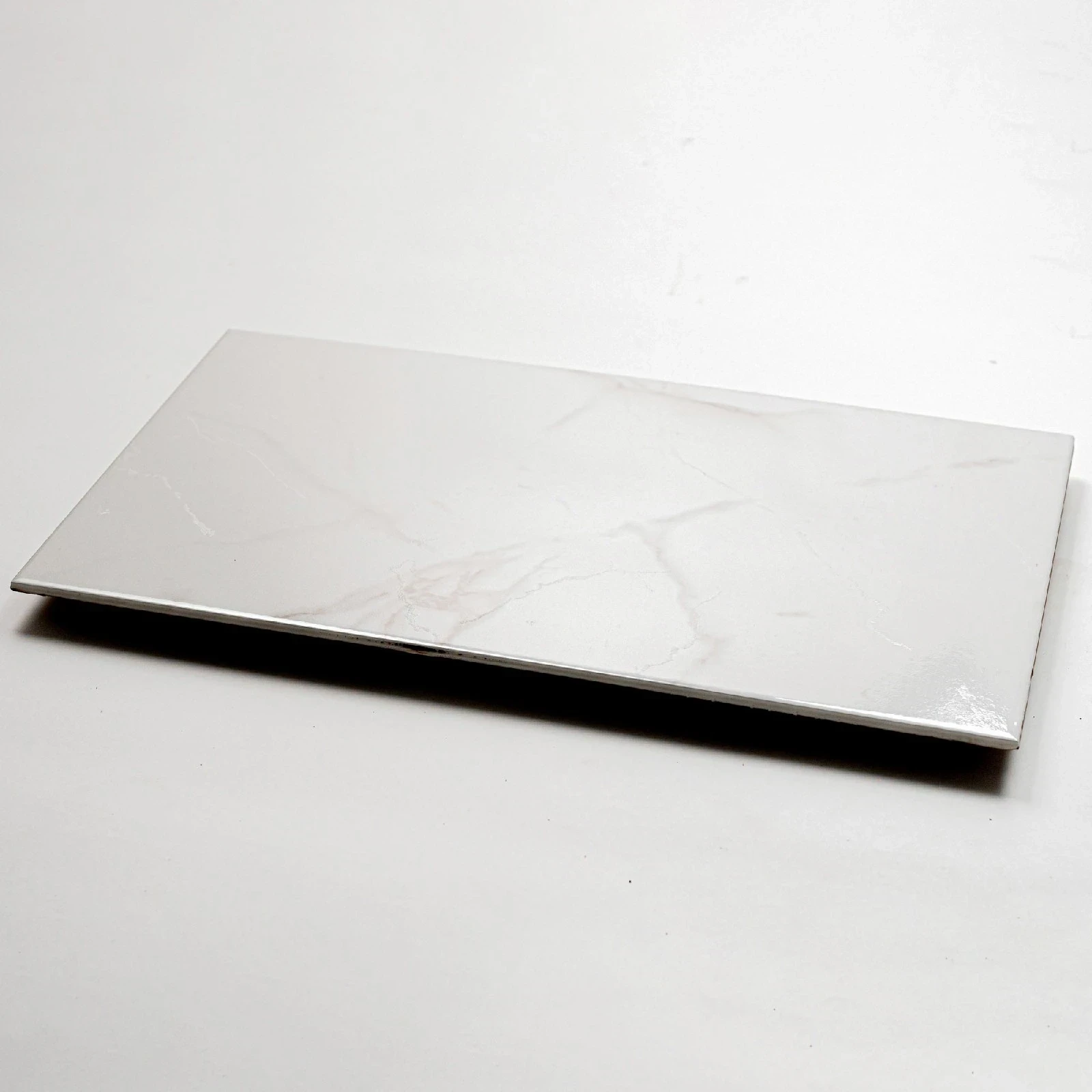 Carrara brillante $10395 mt2