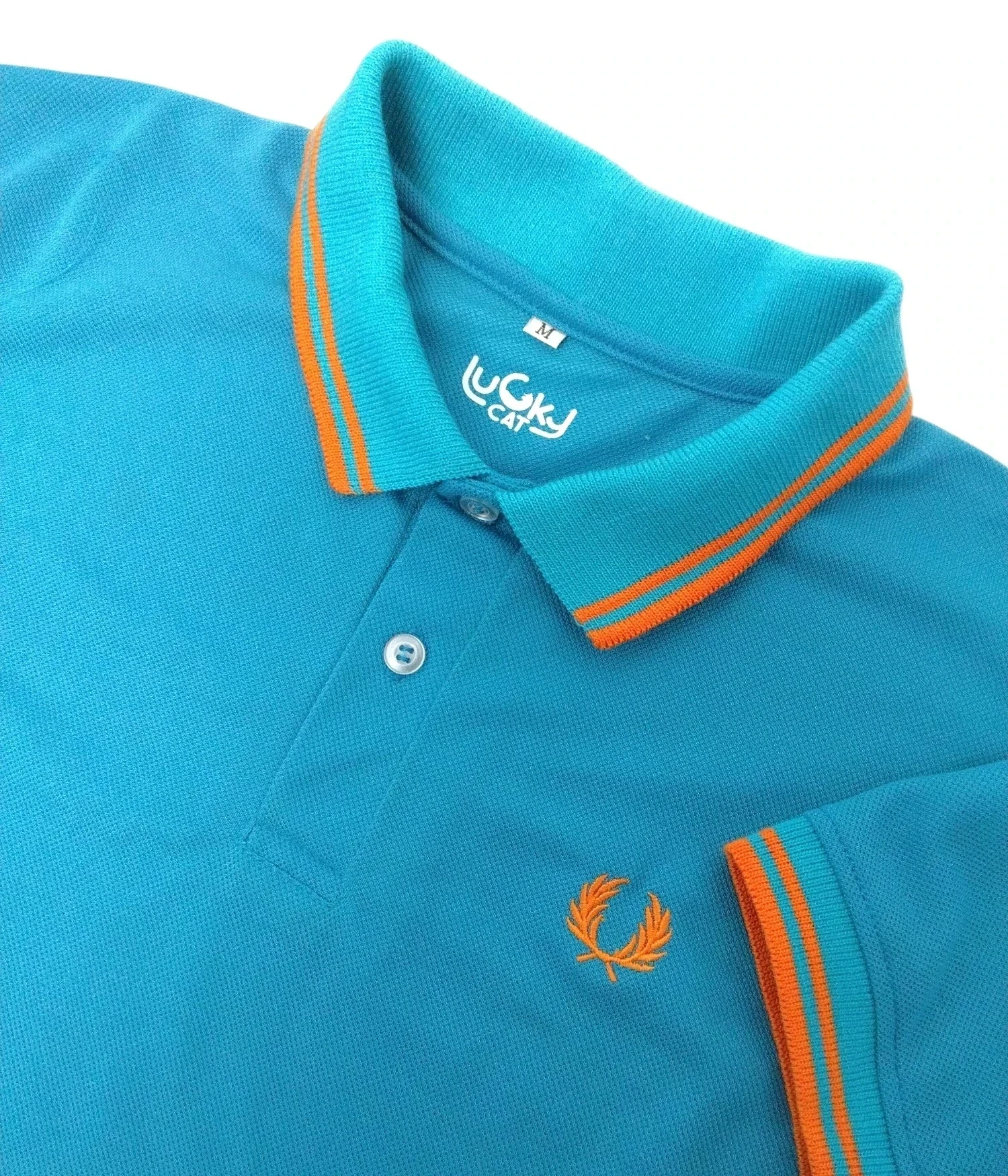 Camisa polo aqua con naranja 