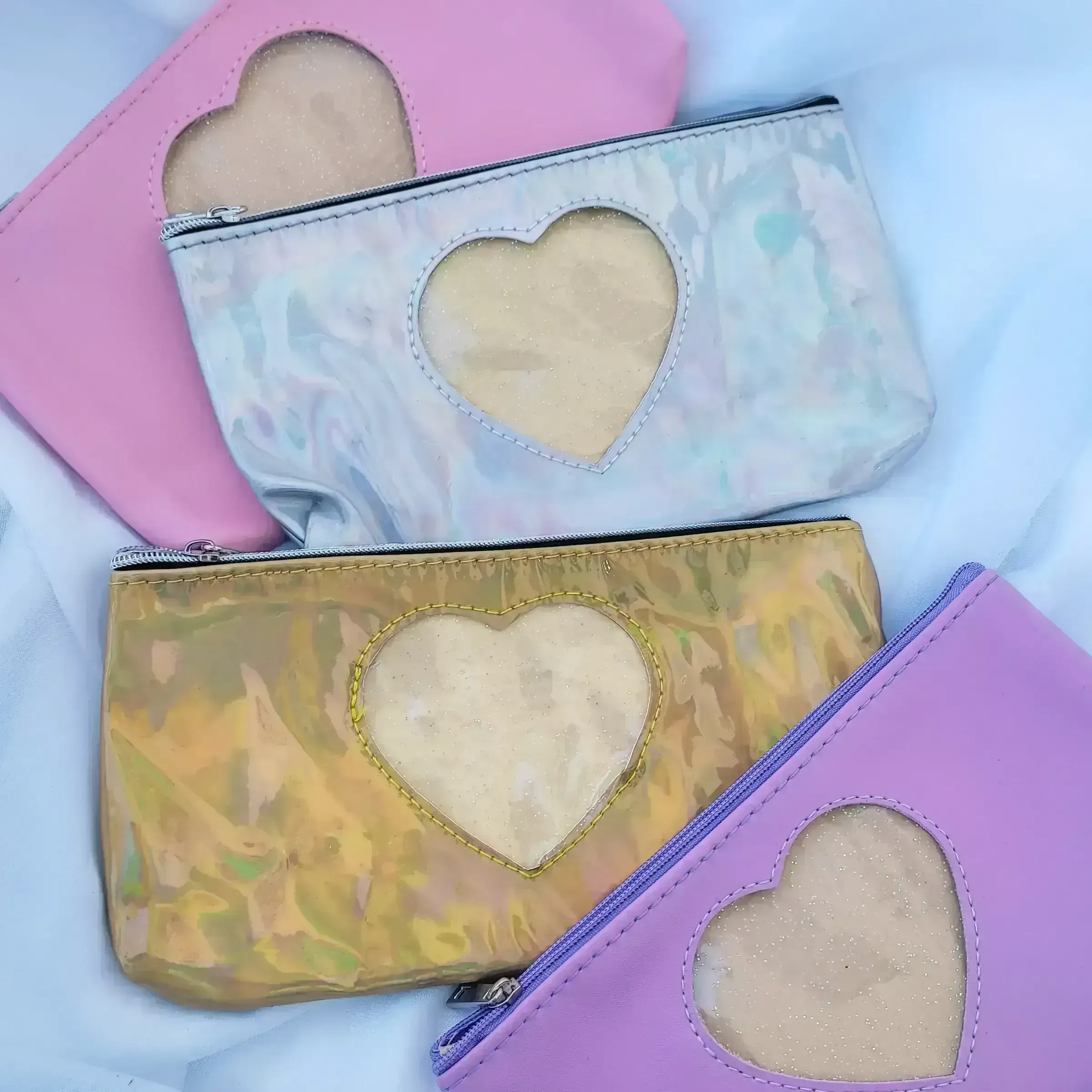 COSMETIQUERAS DE BOLSO CORAZON 