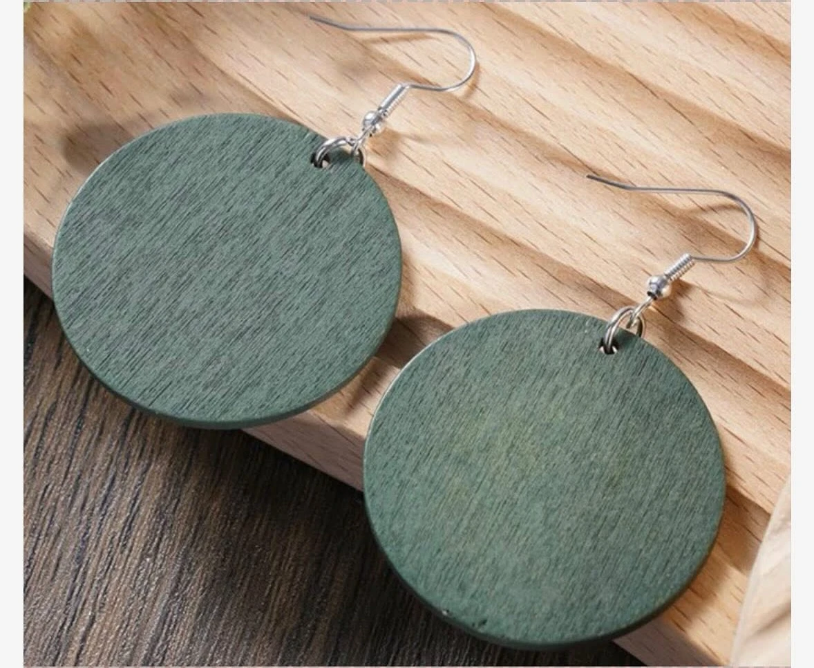 Pendientes con diseño circular en tono verde