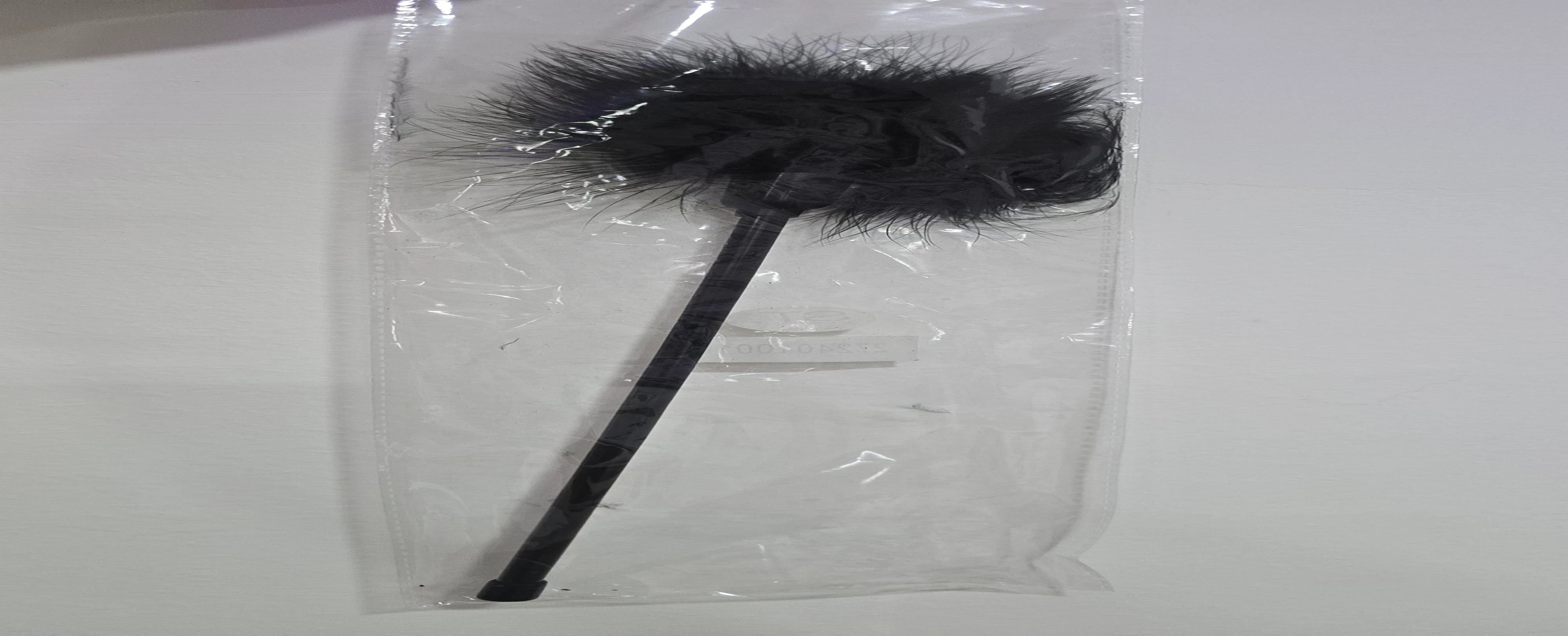 Pluma mango largo