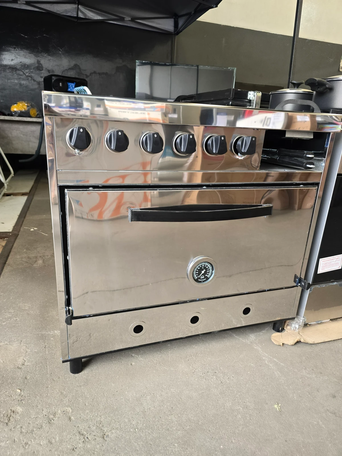 COCINA DELU 4 HORNALLAS C/PLANCHETA Y CARLITERO 86CM GAS ENVASADO 3