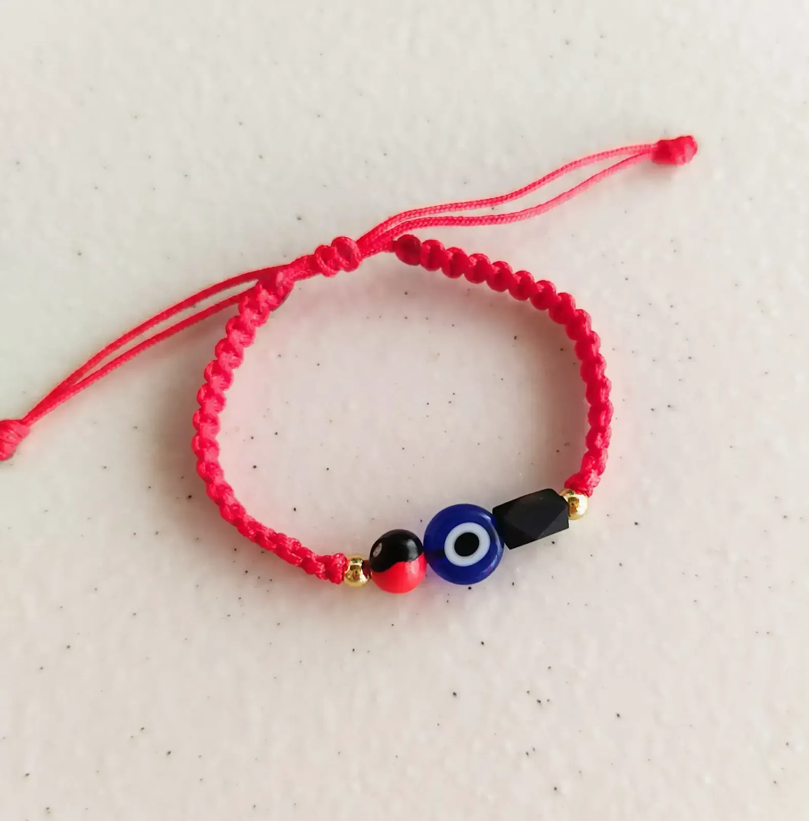 Pulsera bebé protección tejida