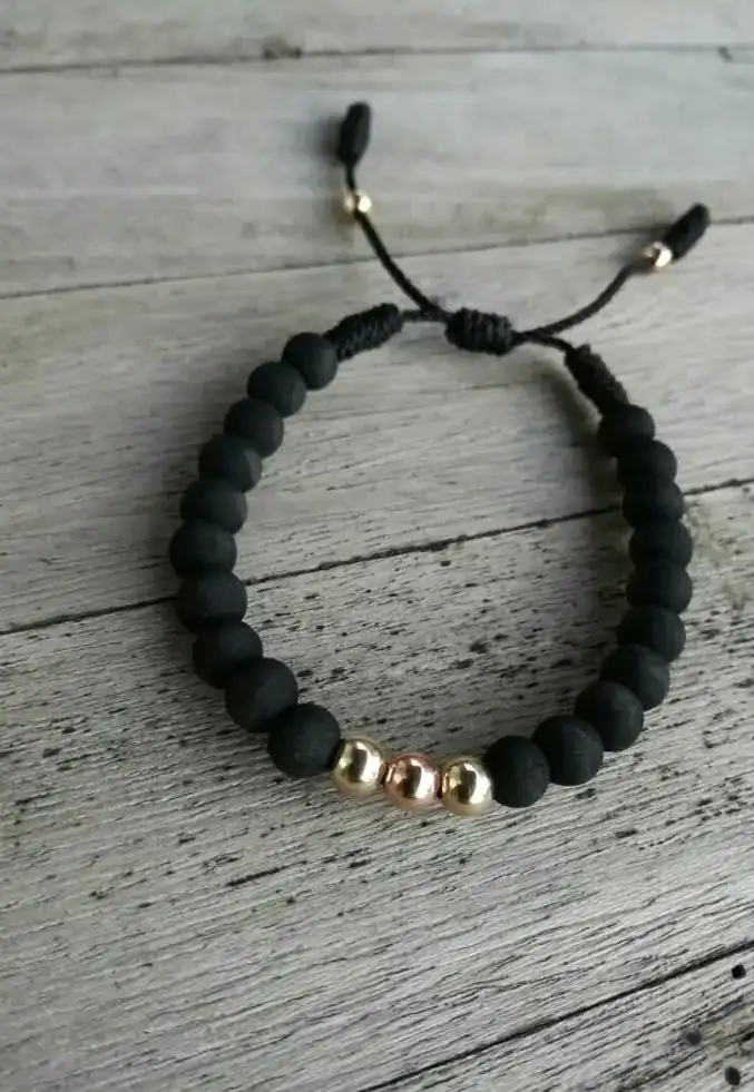 Manilla negra con dorado