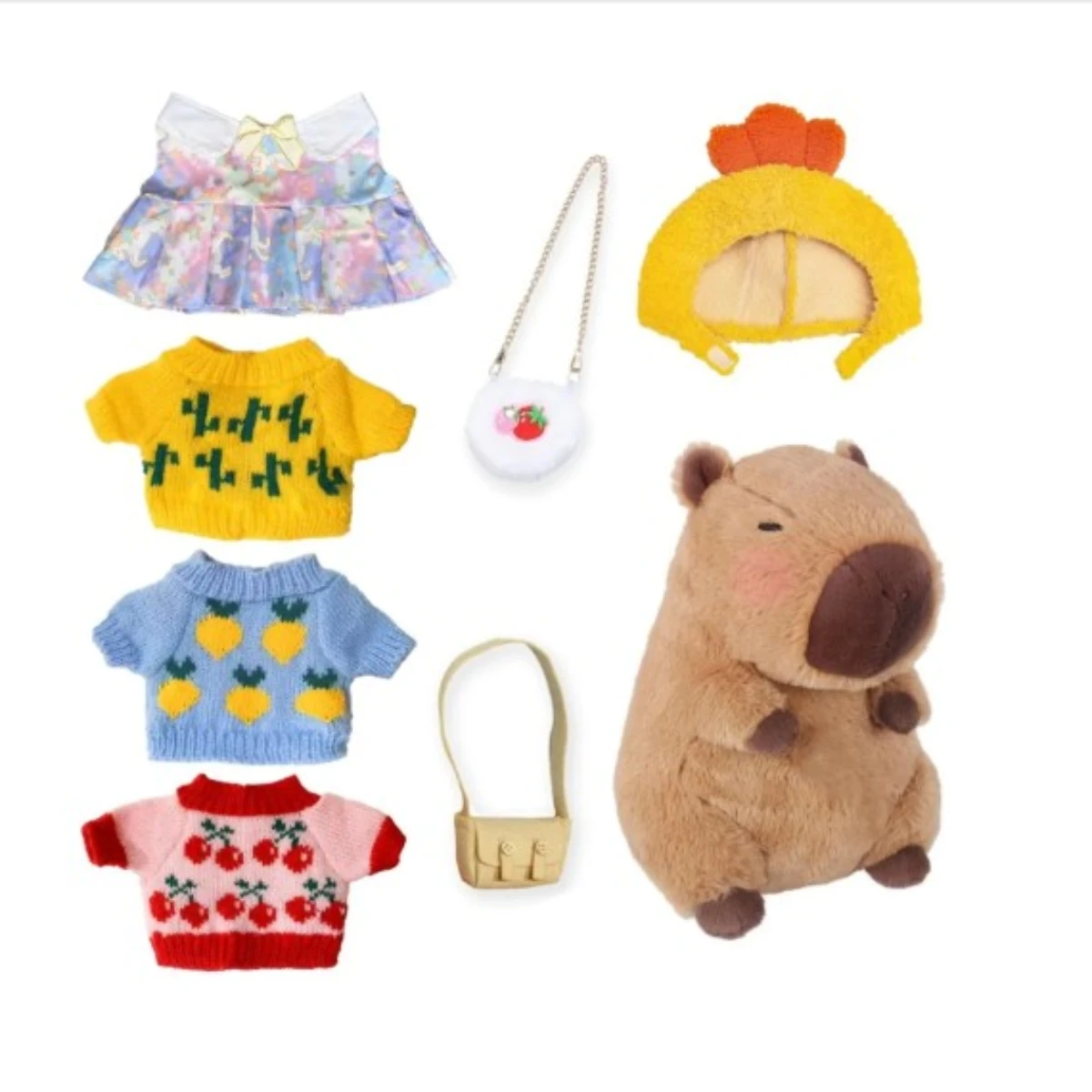 Peluche capibara con 9 piezas de ropa 