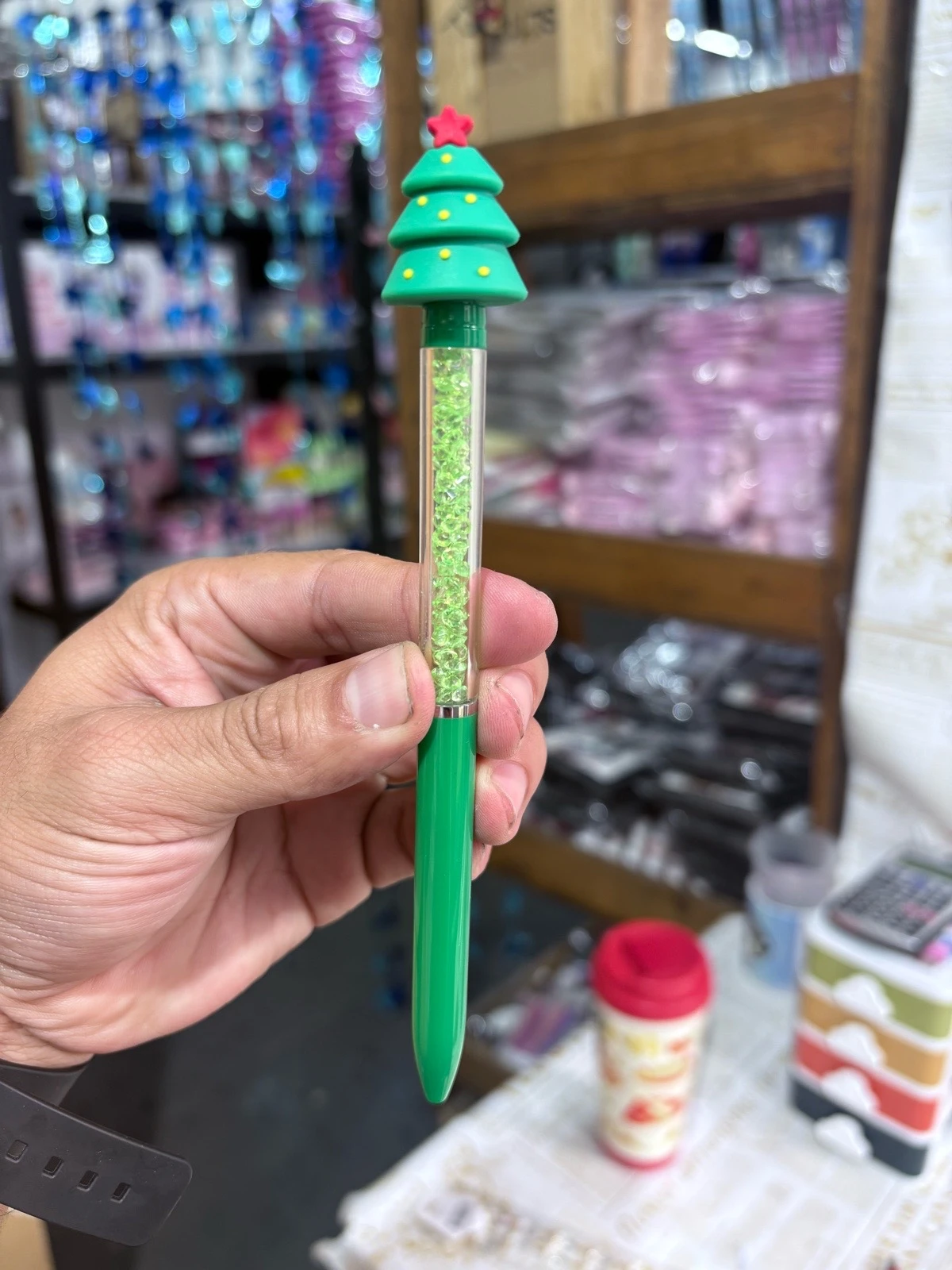 Docena de Plumas Navideñas Con Brillos Y Figuras 3D De Silicona 5