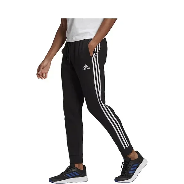 Adidas - Pantalones deportivos cónicos