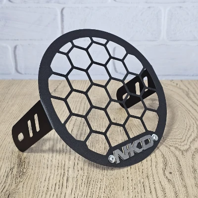 NKD 125 Protector de farola acero negro logo 3d cromado ML