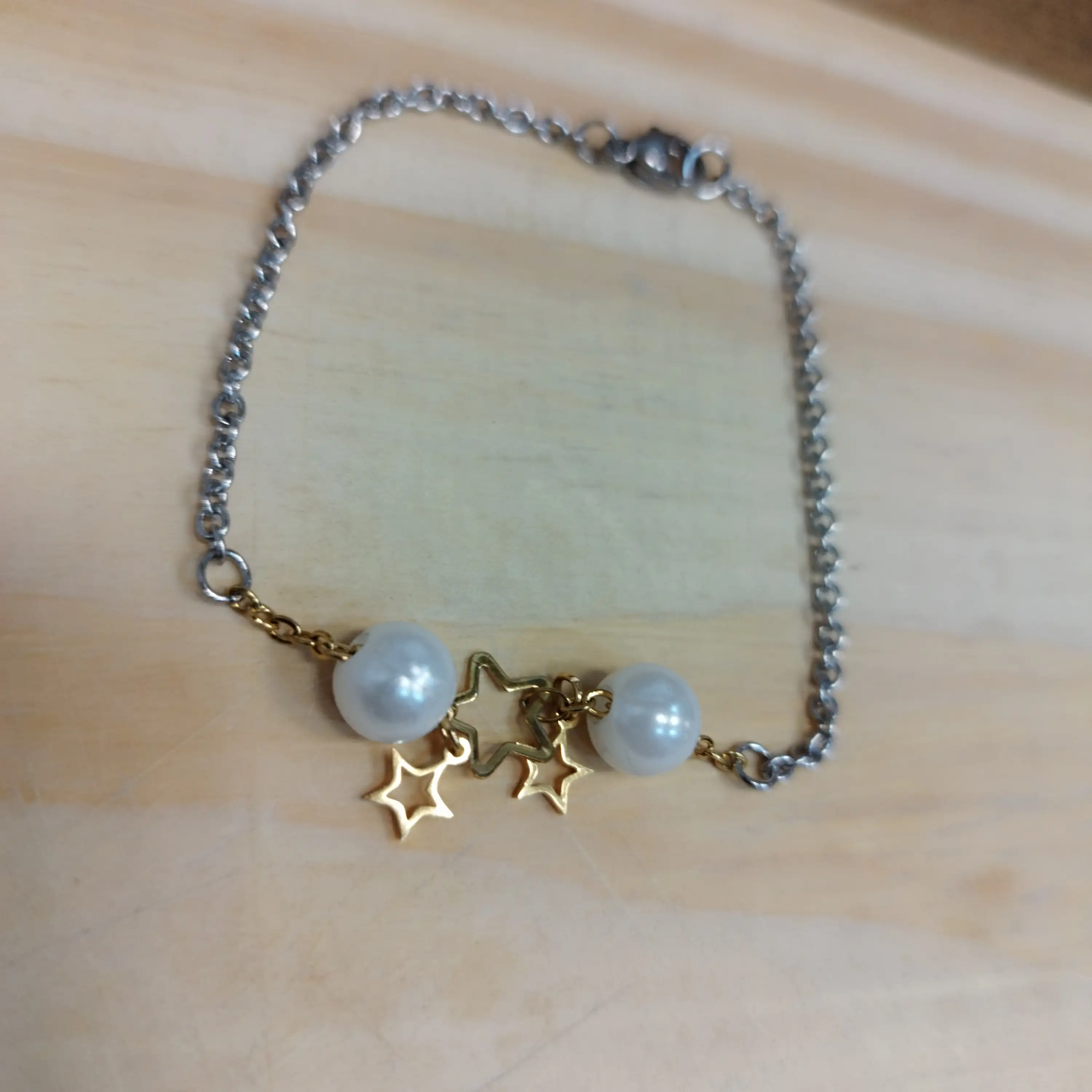 Espejada fusion dorado con perlas y estrellas
