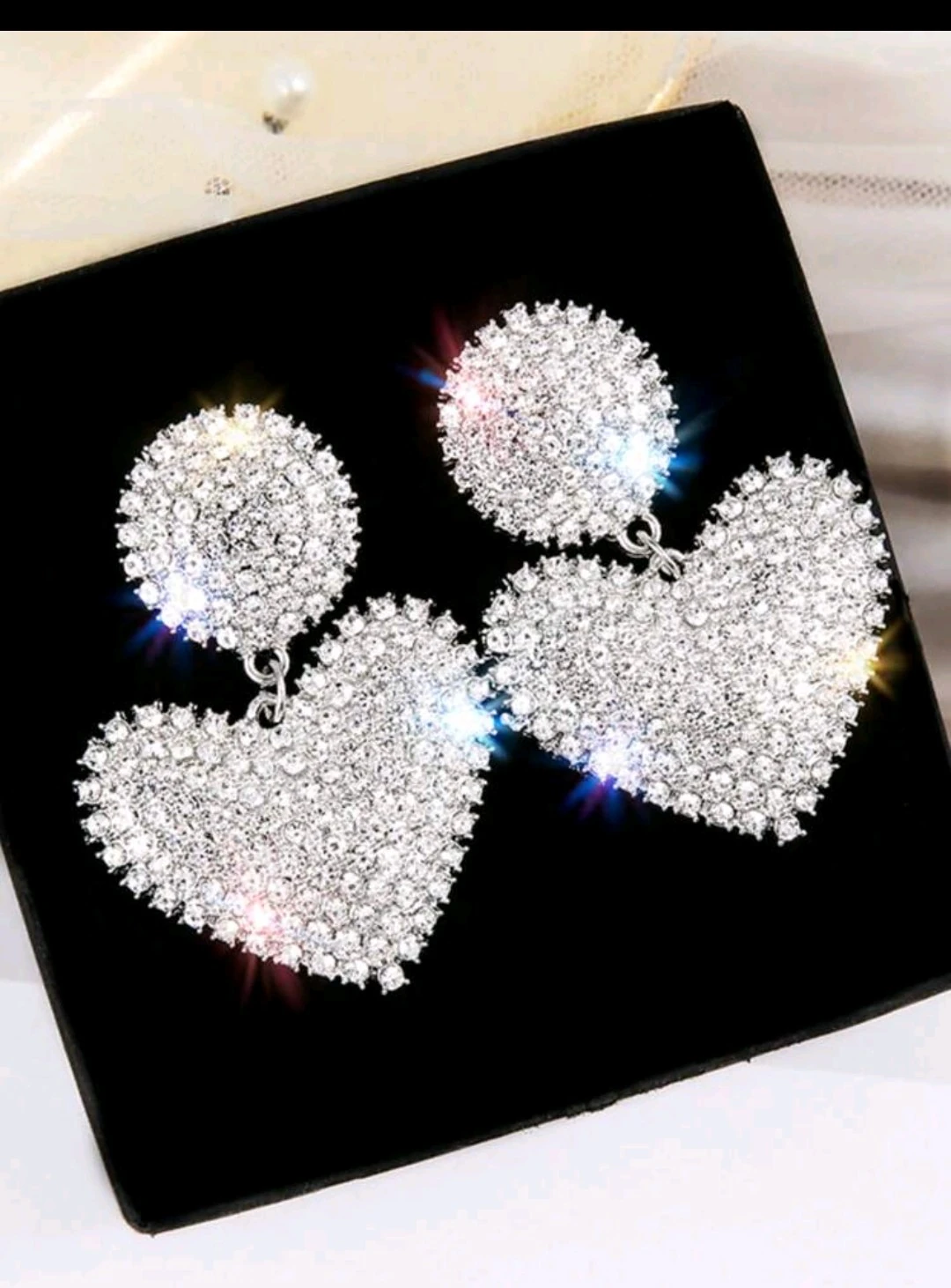 Aretes de corazón plateados