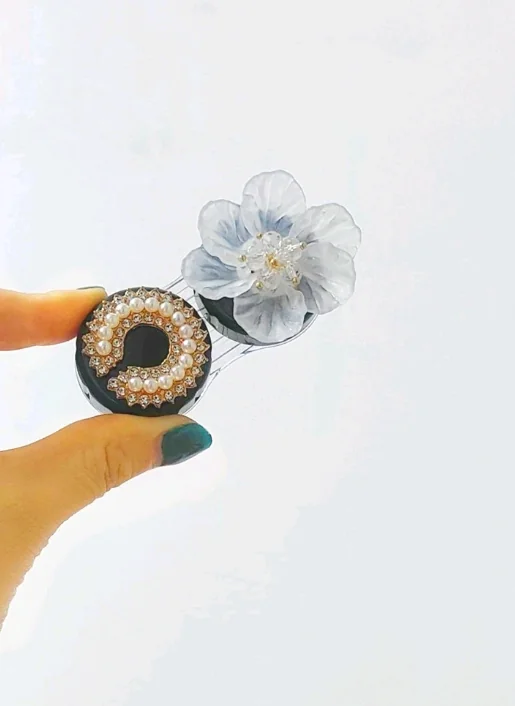 estuche para pupilentes flor/negro