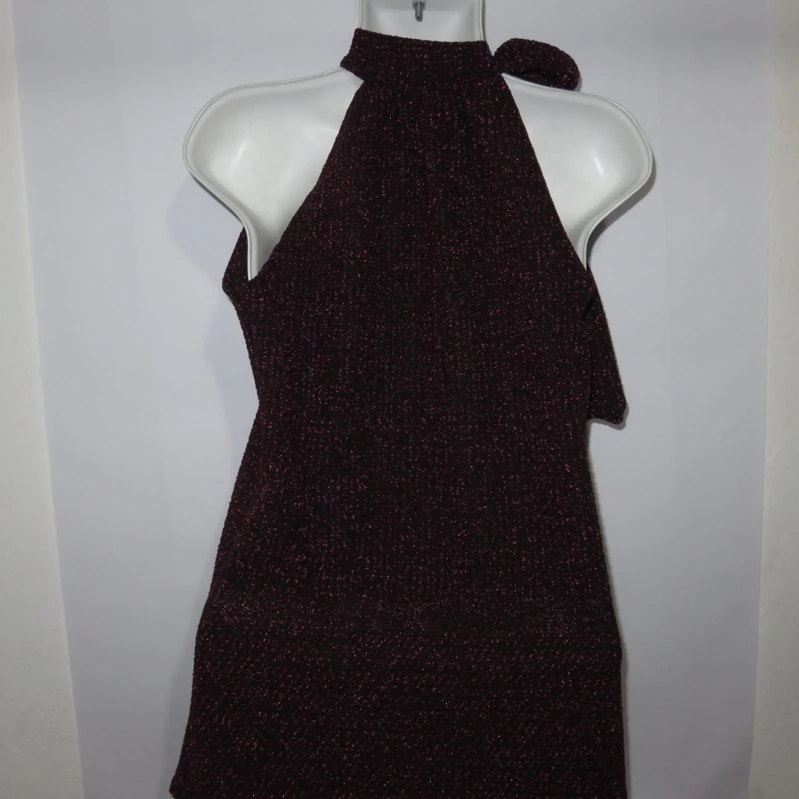 Blusa vino brillosa  larga de moño  2