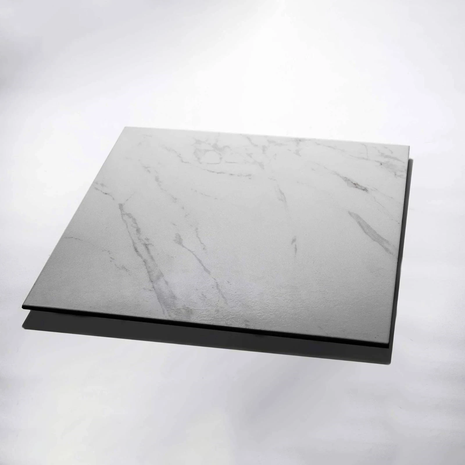 Carrara brillante $12100 mt2 