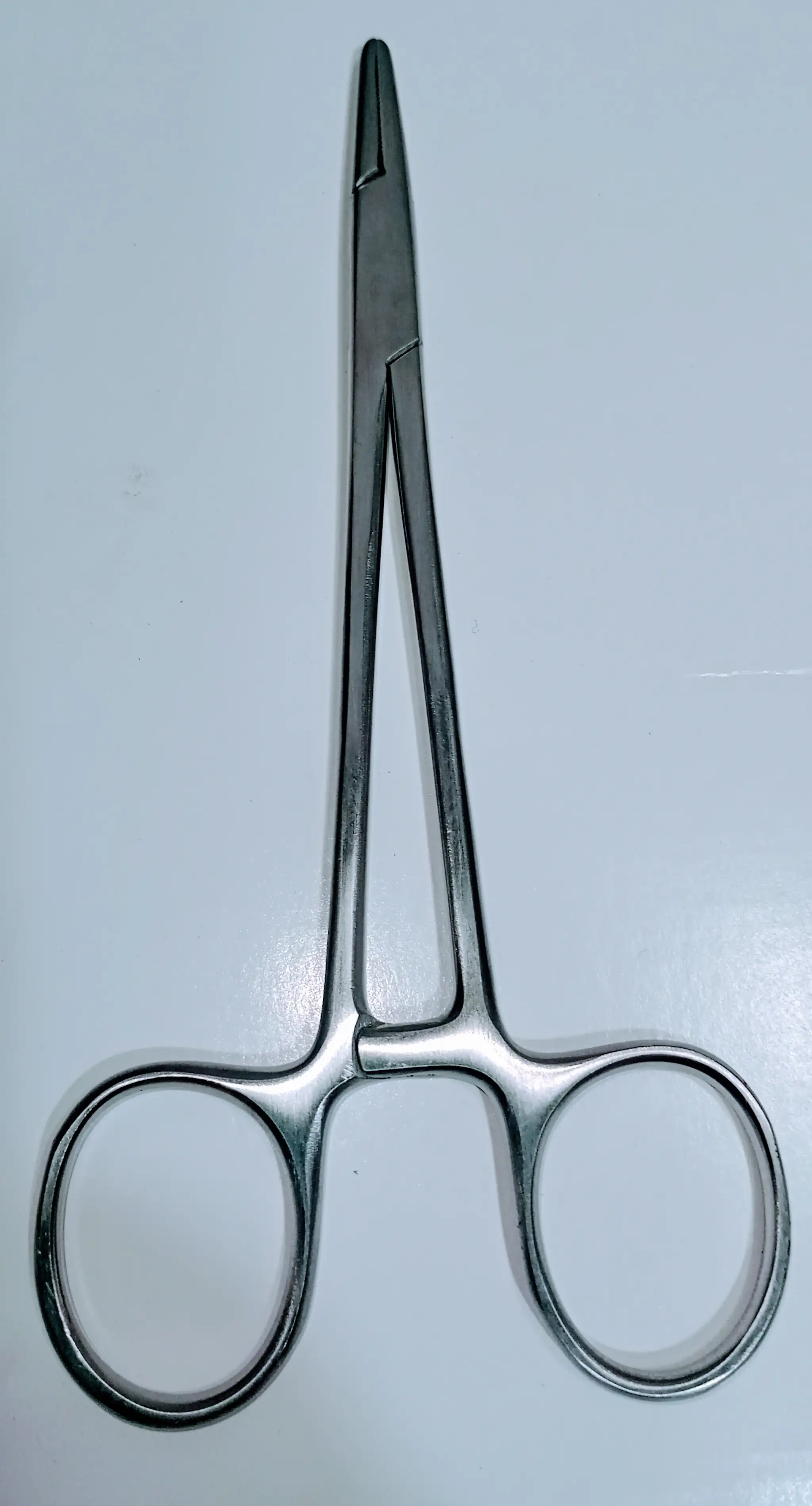 Pinza porta agujas 