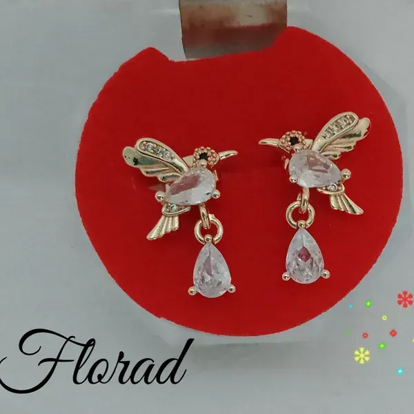 Aretes arracadas huggies