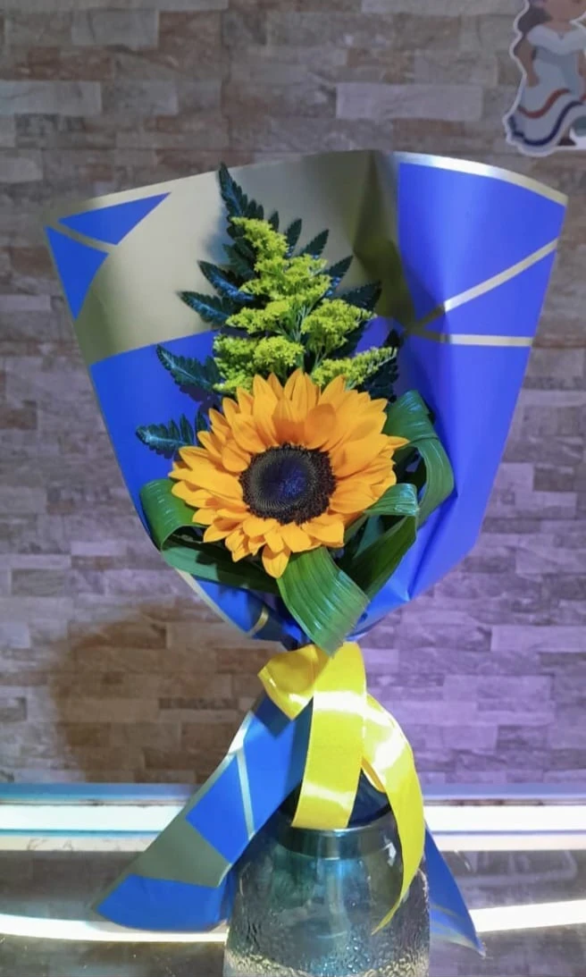 Rosa ó girasol arreglado