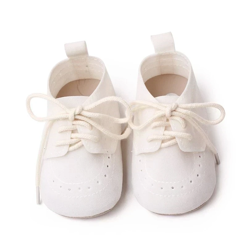 ZAPATITOS BLANCO CORDONES