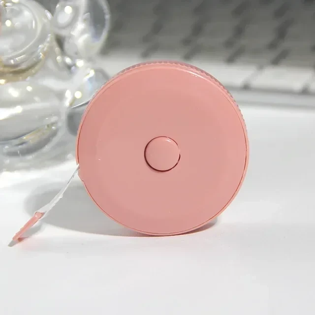 Cinta metrica rosado oscuro