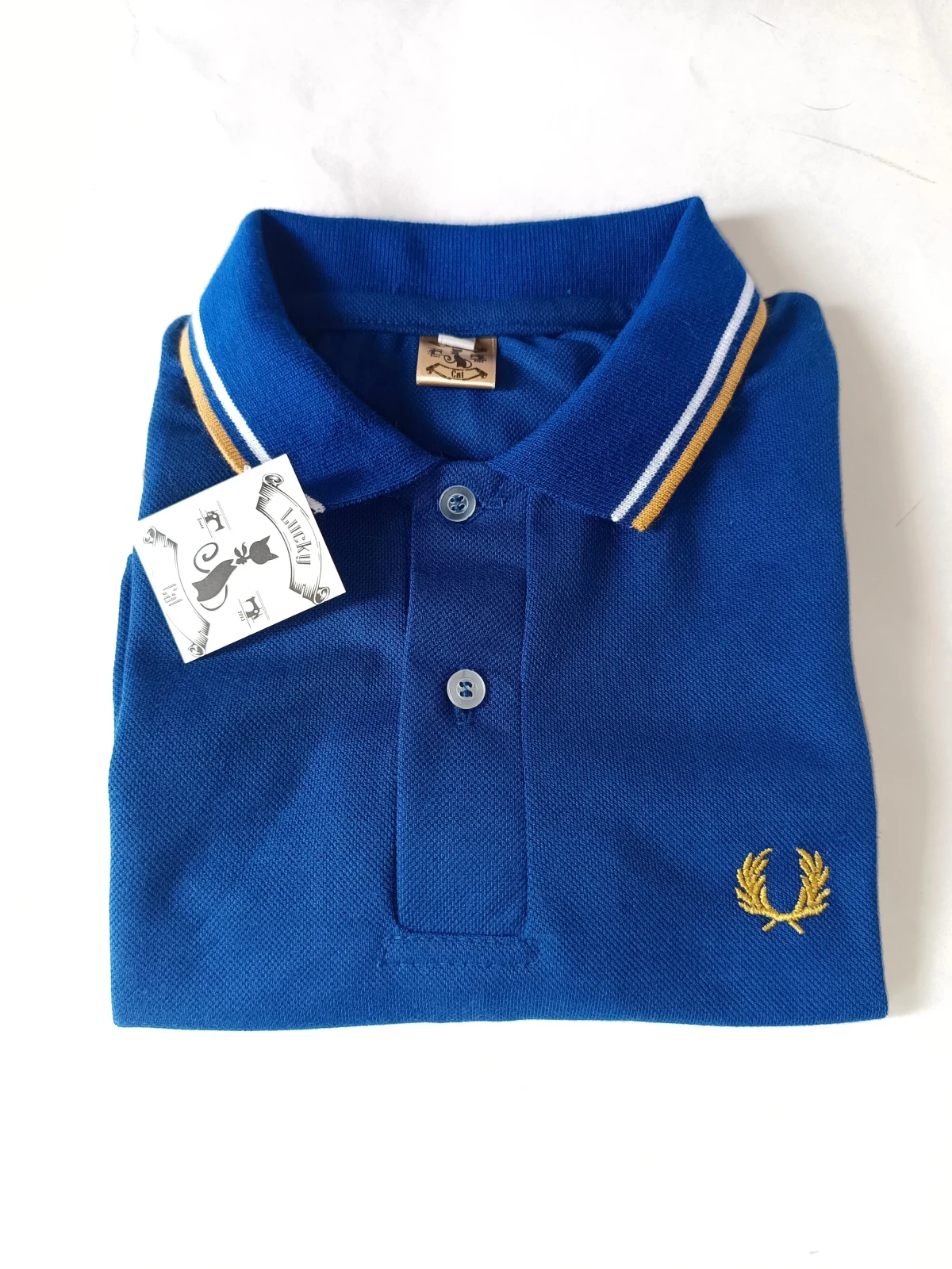 Camisa polo azul rey 