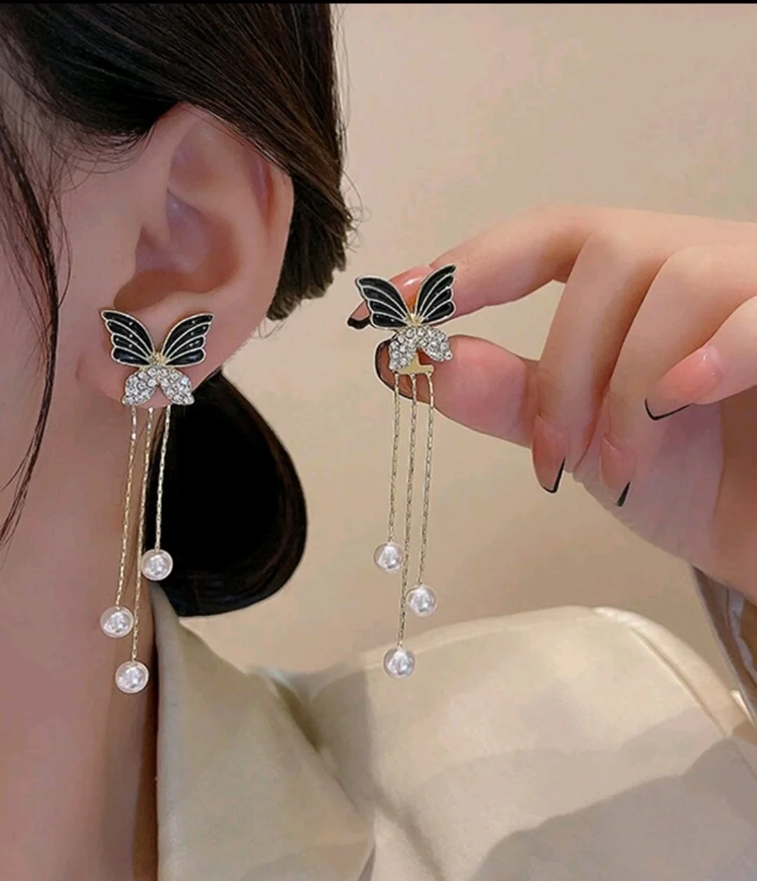 Aretes de mariposa negra 