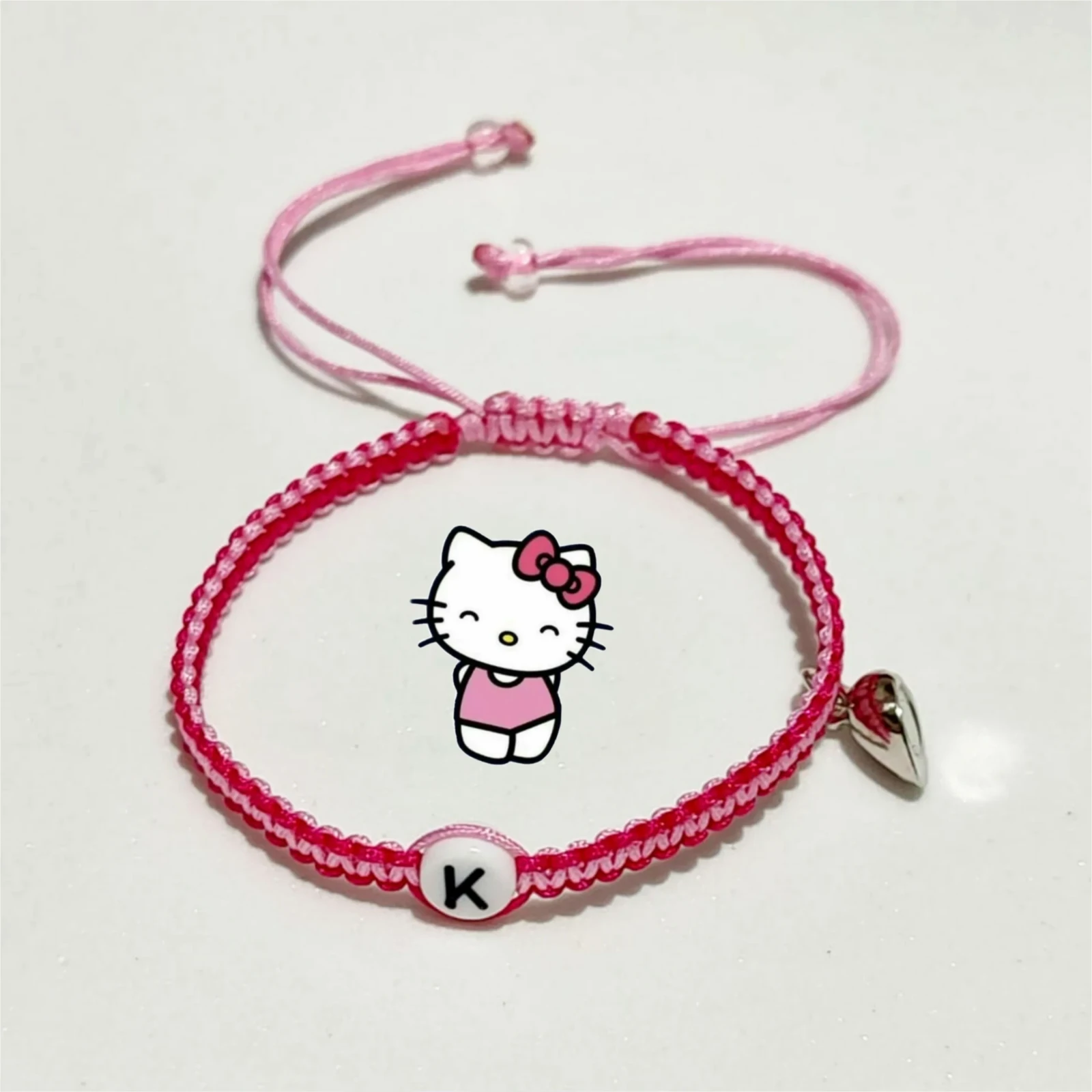 Dúo Pulseras con Iniciales de Hello Kitty y Spiderman 2